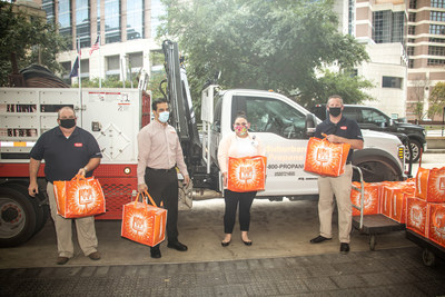 Representatives from Suburban Propane including Bill Hassard and Jesse Moore along with representatives from Whataburger deliver over 850 complete meals to healthcare staff at Houston Methodist Hospital on Wednesday, September 2, 2020.