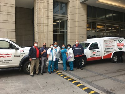 Dave Komosa of Suburban Propane and Joe Aurelio of Aurelio's Pizza delivering 1,000 meals to hospital staff.